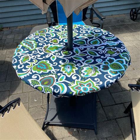 Round fitted tablecloth with umbrella hole - Vinyl Round Fitted Tablecloth with Zipper and Umbrella Hole, Outdoor Oil Waterproof Stain Resisteant PVC Table Cover for Party, Picnic and Patio 45-56 Inch, Grey Moroccan 4.5 out of 5 stars 1,057 $15.99 $ 15 . 99 
